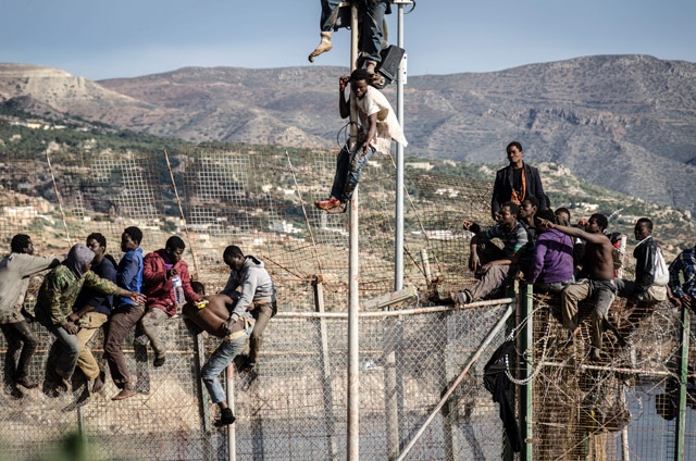 Migrant stampede kills 18 trying to cross into Melilla