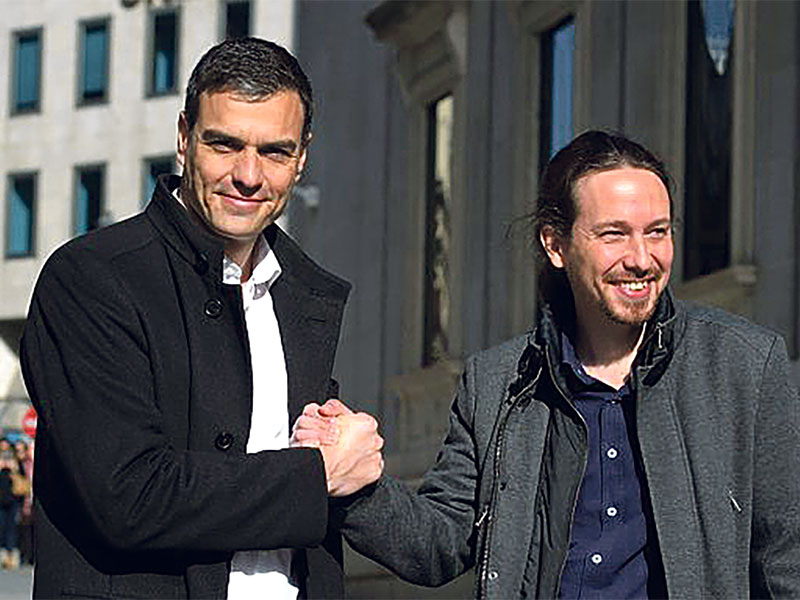 NEW GOVERNMENT: Pedro Sanchez (left) with Pablo Iglesias.