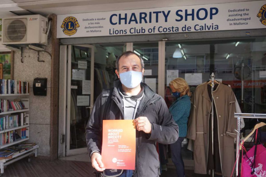 Age in Spain Regional Co-ordinator outside the Lions Charity Shop Palma Nova
