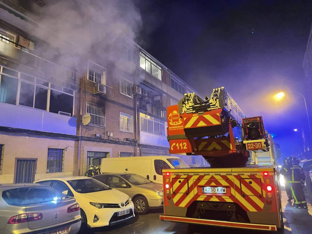 One dead and 22 injured in fire at block of flats in Madrid