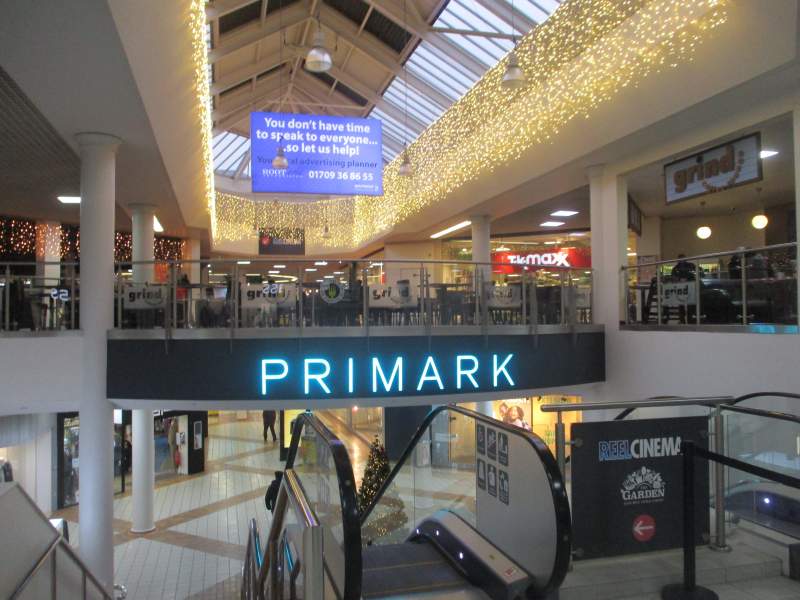 Customers await the reopening of Primark stores
