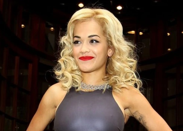 "Find this man" Rita Ora pleads with fans as singer blown away with dancing from audience