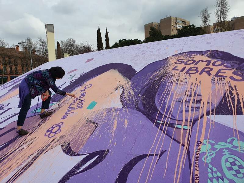 Locals come together to restore feminist mural targeted by vandals