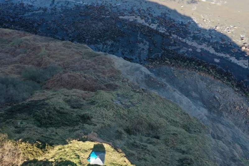 Couple and Child Rescued after Camping on Cliff Edge despite COVID Restrictions
