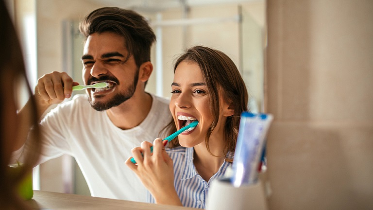 Scientists Say Brushing Your Teeth Could Lower The Risk Of Severe Covid