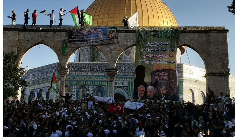 Palestinians protest outside the Dome of the Rock in Jerusalem