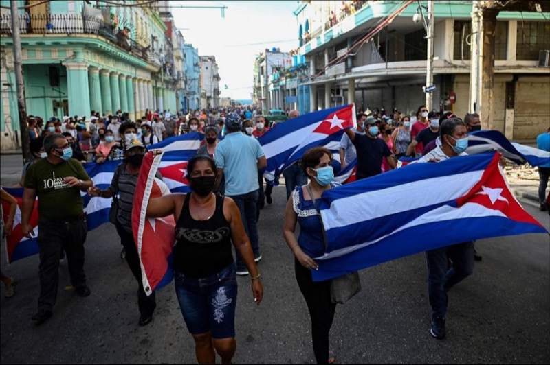 Thousands take to the streets in Cuba shouting 'down with the dictatorship'