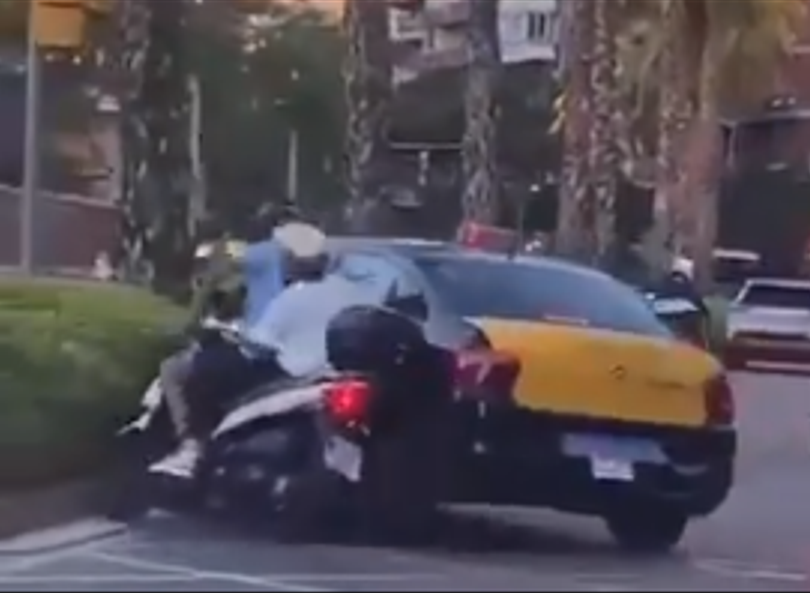 Barcelona taxi driver has his licence revoked after knocking two people off a motorcycle