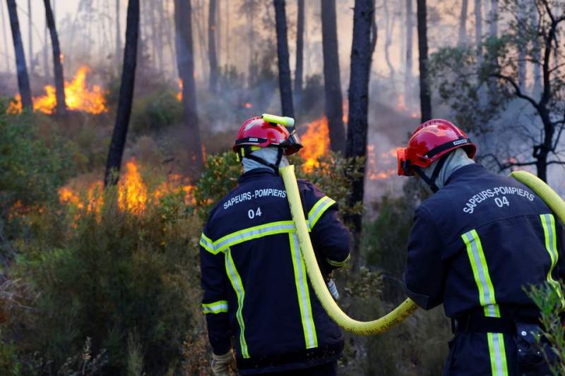 Wildfires near French resort of Saint-Tropez kills two people as thousands flee the riviera
