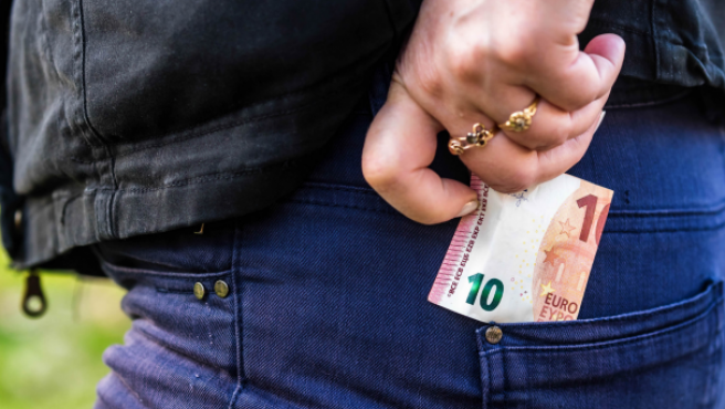 Spain's penal code punishes people for not handing in money found in the street