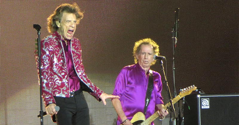 Singer Mick Jagger and guitarist Keith Richards perform with their band, The Rolling Stones