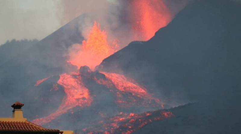 German couple take refuge on boat as volcano threatens their home