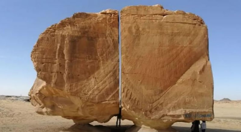 Giant rock cut in half by alien lasers in the Saudi Arabian desert