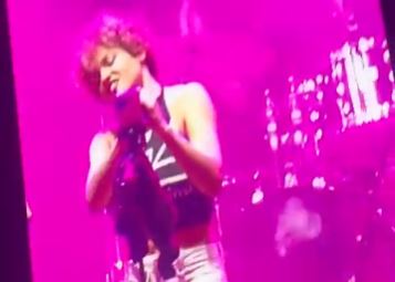 Band apologises after lead singer pees on fan’s face mid-show