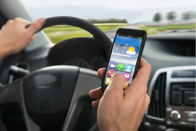 UK law clamps down on mobile use by drivers