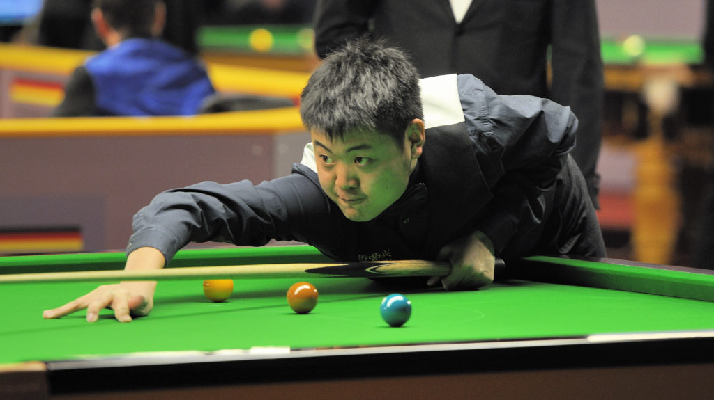 Snooker star charged for assaulting woman