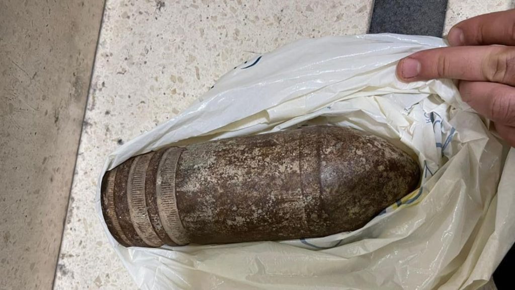 American family clears airport as they try to fly with unexploded shell