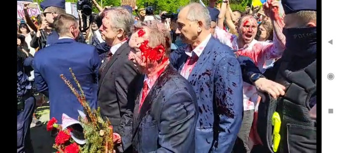 Russian Ambassador doused in "blood of Ukraine" by Polish anti-war protesters