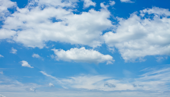Image of a cloudy blue sky.