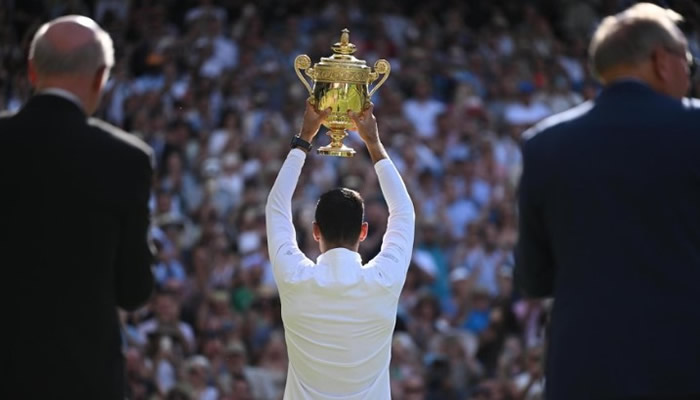 Novak Djokovic wins his fourth consecutive Wimbledon men's singles title