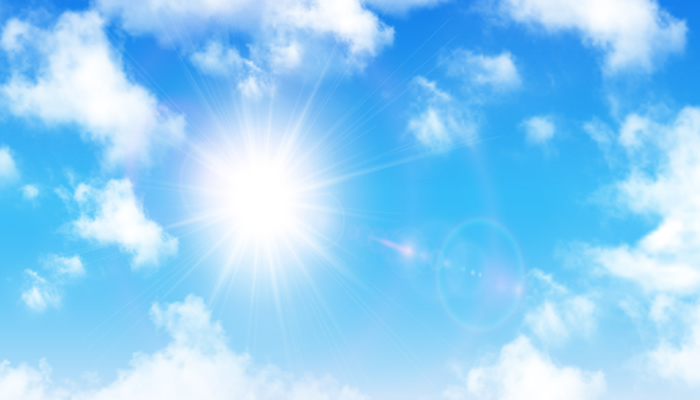 Image of a cloudy but sunny blue sky.