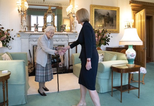 All change at the top: Boris says bye as Liz meets Liz