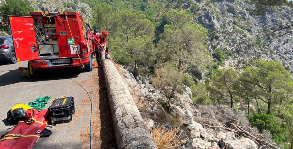 Firefighters rescue 71-year-old cyclist who fell down embankment in Spain's Mallorca