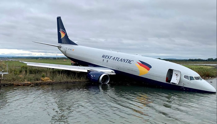 French airport closed 'indefinitely' after cargo plane overshoots runway into a lake