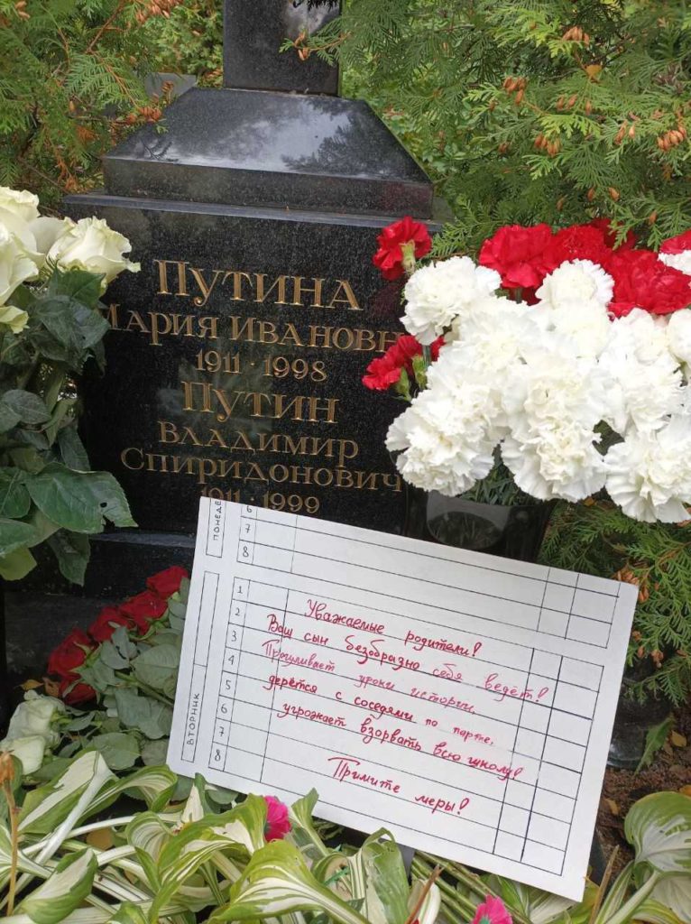 Activists leave message on grave of Putin's parents in Russia's St Petersburg