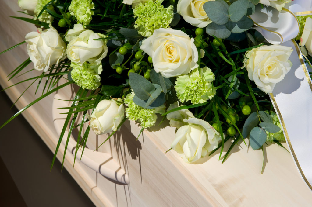 Flowers arranged on a coffin