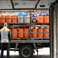 Image of a lorry carrying butane gas cylinders in Spain.