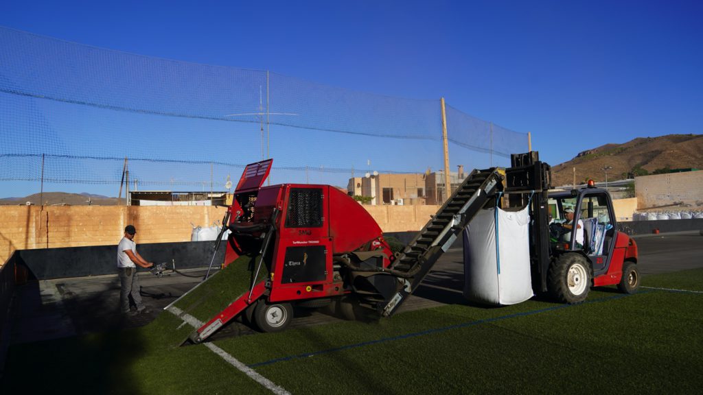 Work begins on replacing the grass at the Salva Sevilla football pitch in Berja