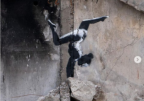 Banksy works of art appear on damaged buildings in Ukraine