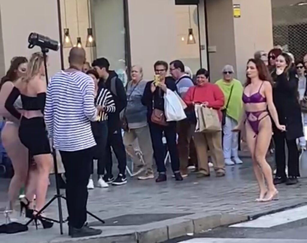 WATCH: Scantily clad women warm up a cold day in Spain's Malaga