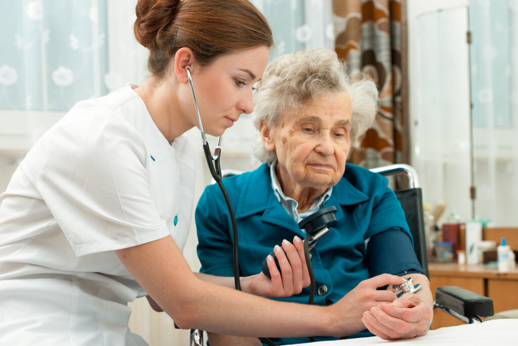 Image of a nurse with a patient.