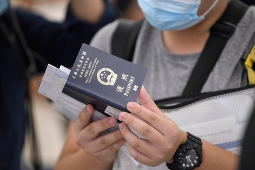 China prepares for mass exodus as people rush to renew passports