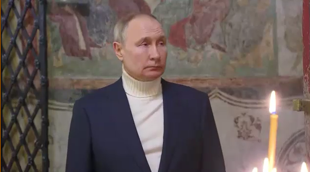 Putin attends Christmas service, alone, casually dressed and dejected