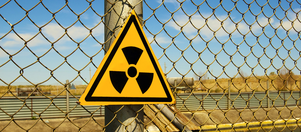 Image of radiation warning sign at Uranium processing facility.