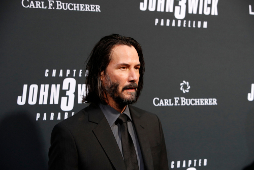 Keanu Reeves stalked by man carrying DNA test kit