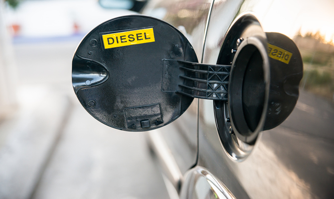 Image of a petrol cap with diesel written on it.