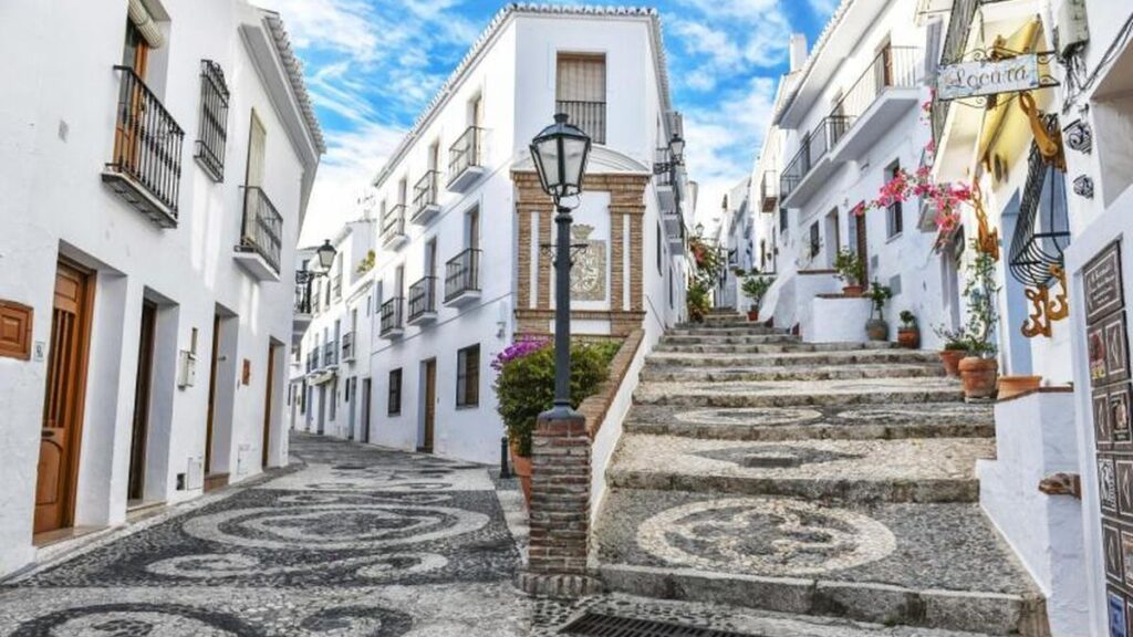 white houses in the southern town of Frigiliana. Spain's property market soars.
