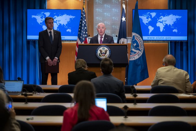 US authorities give a speech at the Department of State and Homeland Security.