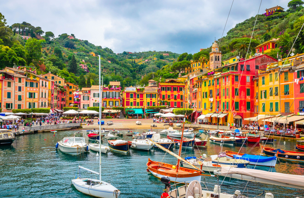 Beautiful bay with colourful houses and boats in Italy's dock