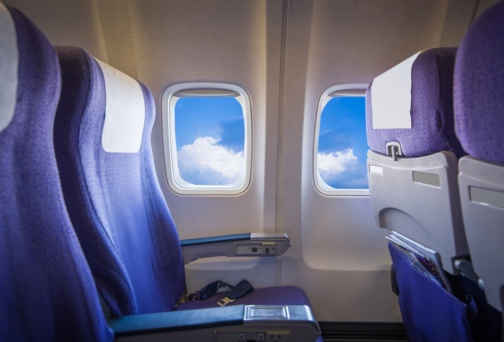 ATTENTION all passengers, where IS the best place to sit on a plane?