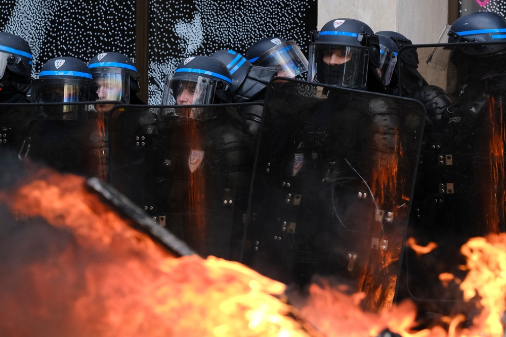 Image of riot police in Paris.
