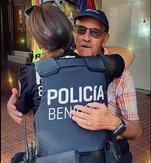 José Manuel hugging Local Police officer Cyntia