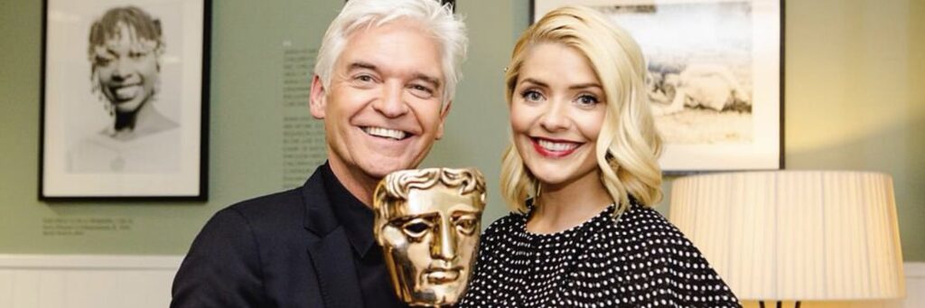Phillip Schofield and Holly Willoughby with award