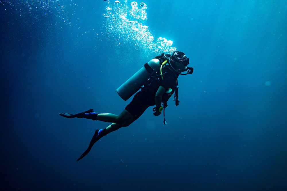 A man scuba diving in the sea