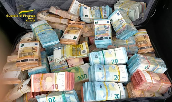 Image of cash seized in police operation.