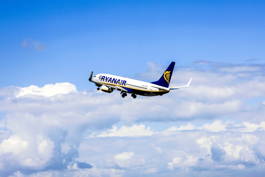 An image of a Ryanair plane in flight